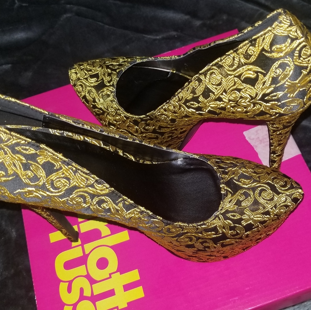 Black and gold heels